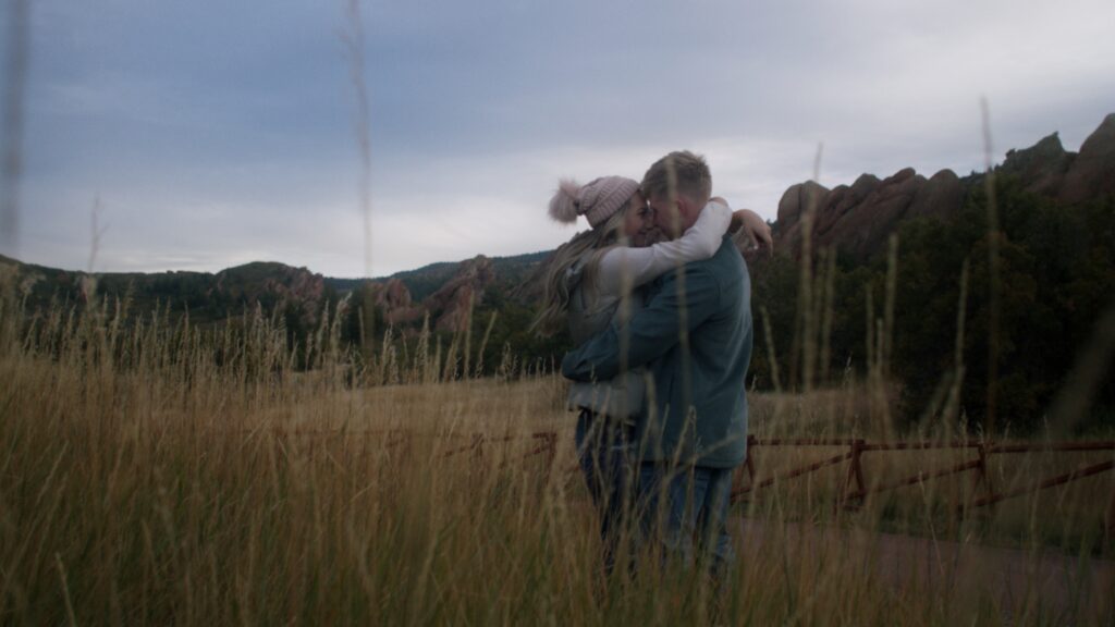 couple hugging during engagement  session